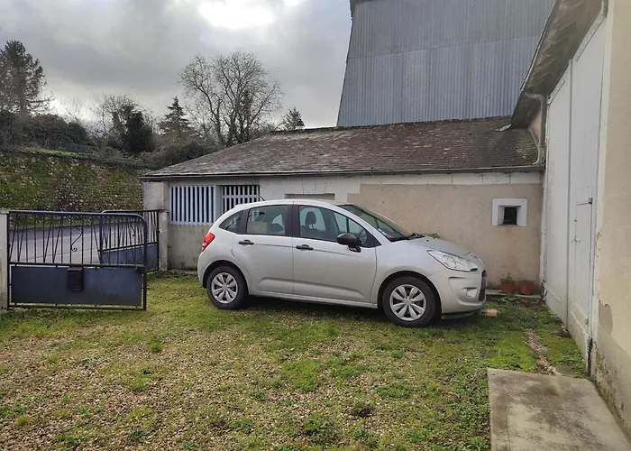 Maison plein pied dans bourg avec tous commerces