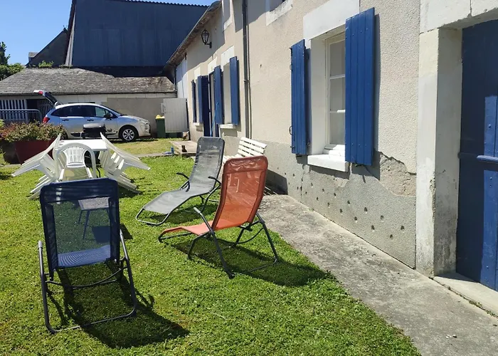 Maison plein pied dans bourg avec tous commerces